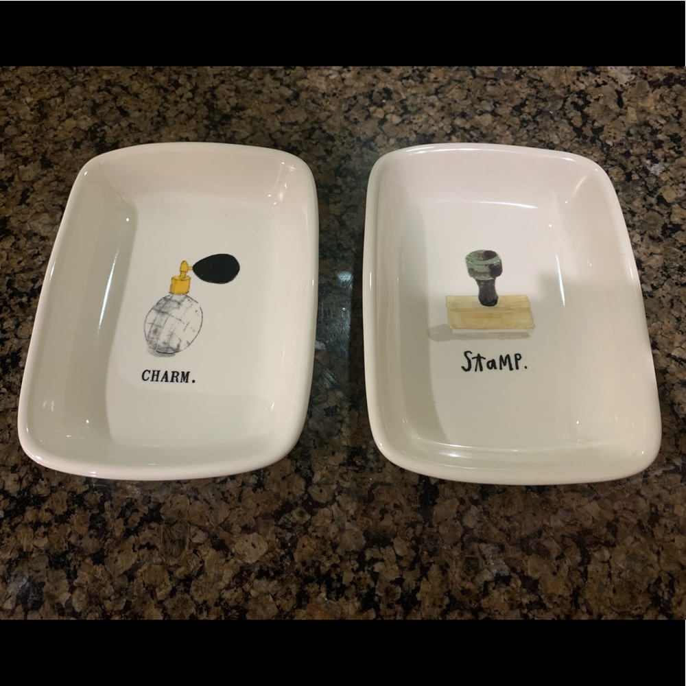 Two Rae Dunn Trays “stamp” and “charm”